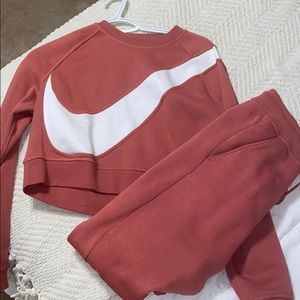 Pink Nike track suit